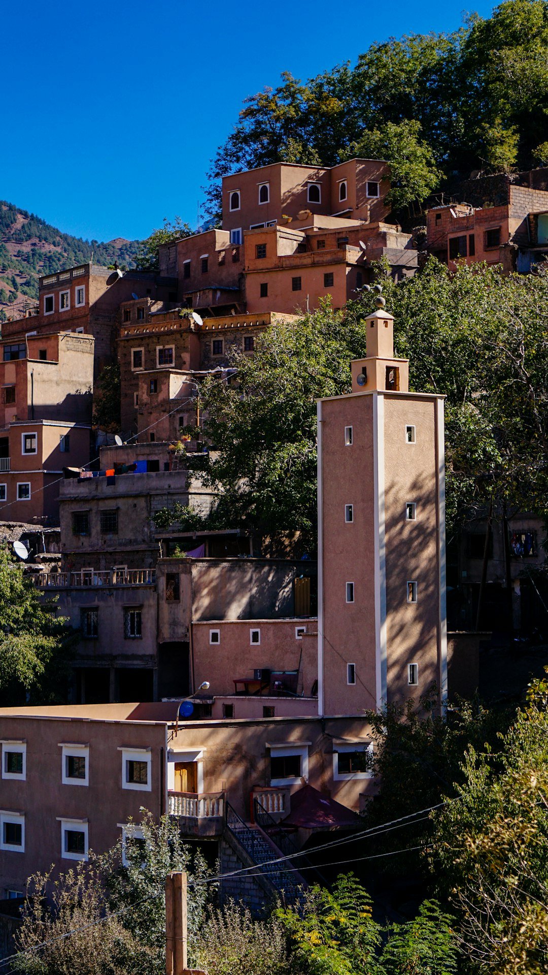 traditional-village-with-terracotta-buildings-on-a-hillside-eety0adest4