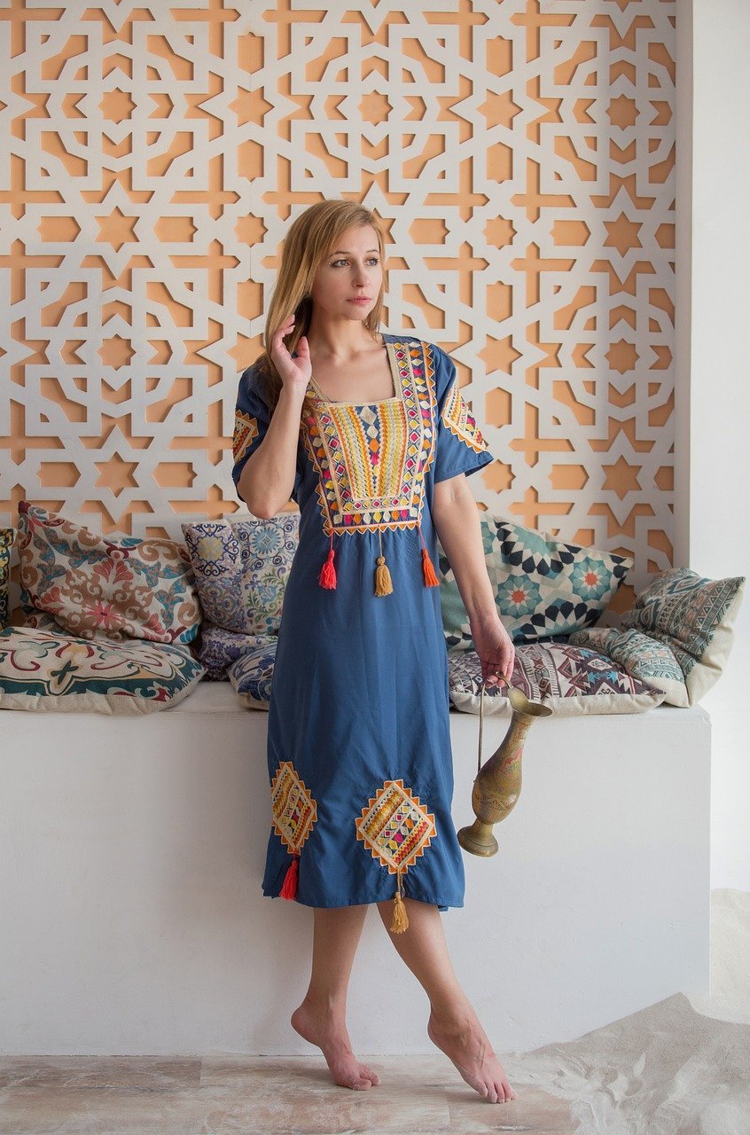 why-choose-us-01 woman, moroccan style, arabic interior, model, posing, dress with embroidery